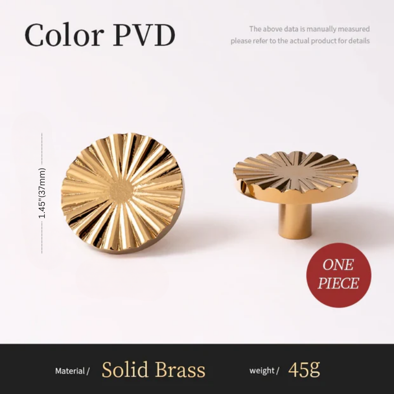 Two gold-colored metal knobs with dimensions and material details on a white background