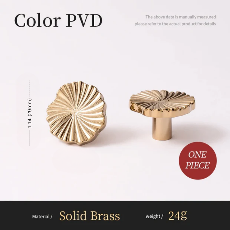 Two gold decorative knobs with measurements and material details on a white background