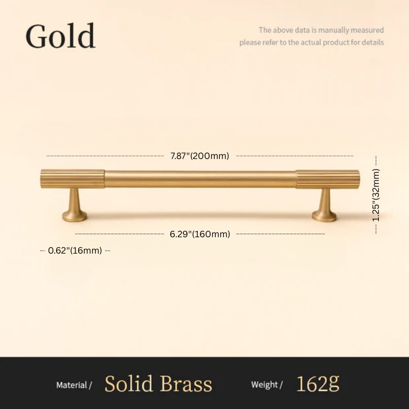 Gold cabinet handle with dimensions and material details on a beige background