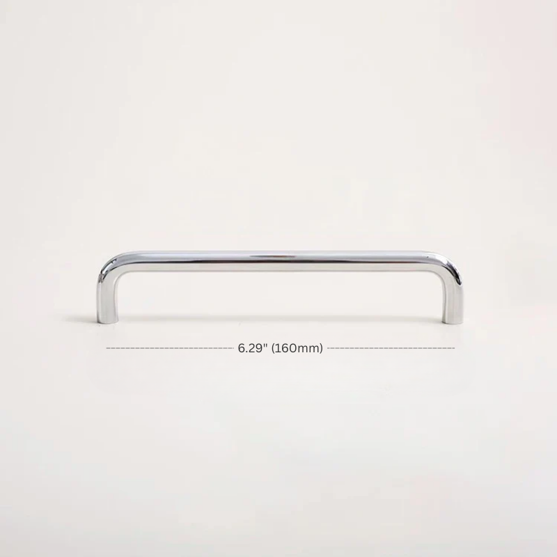 Chrome cabinet handle on a white background with measurement text.