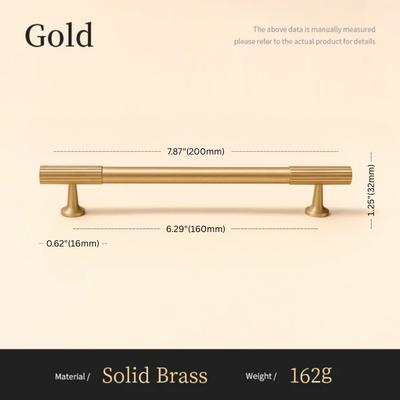 Gold cabinet handle with dimensions and material details on a beige background