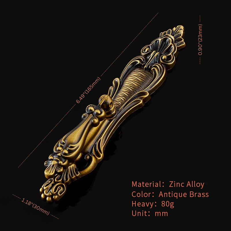 Decorative brass handle with measurements and material details on a black background