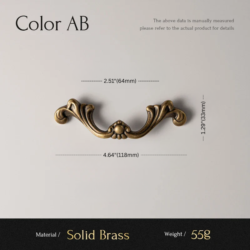 Decorative brass handle with measurements on a gray background