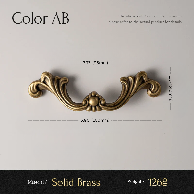 Decorative brass cabinet handle with measurements on a gray background
