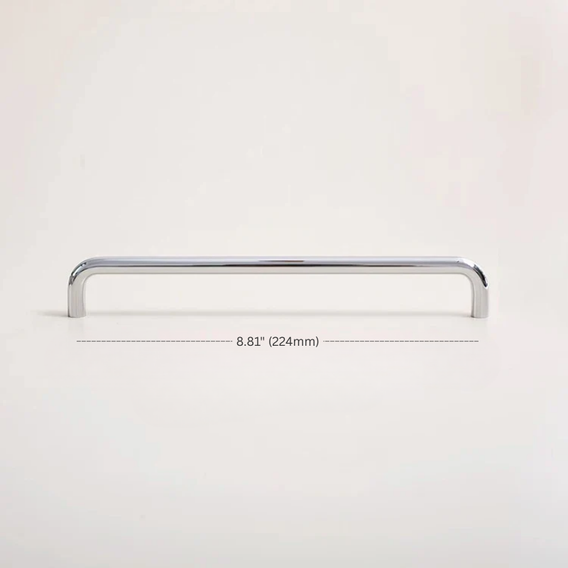 Chrome cabinet handle with measurement text on a white background