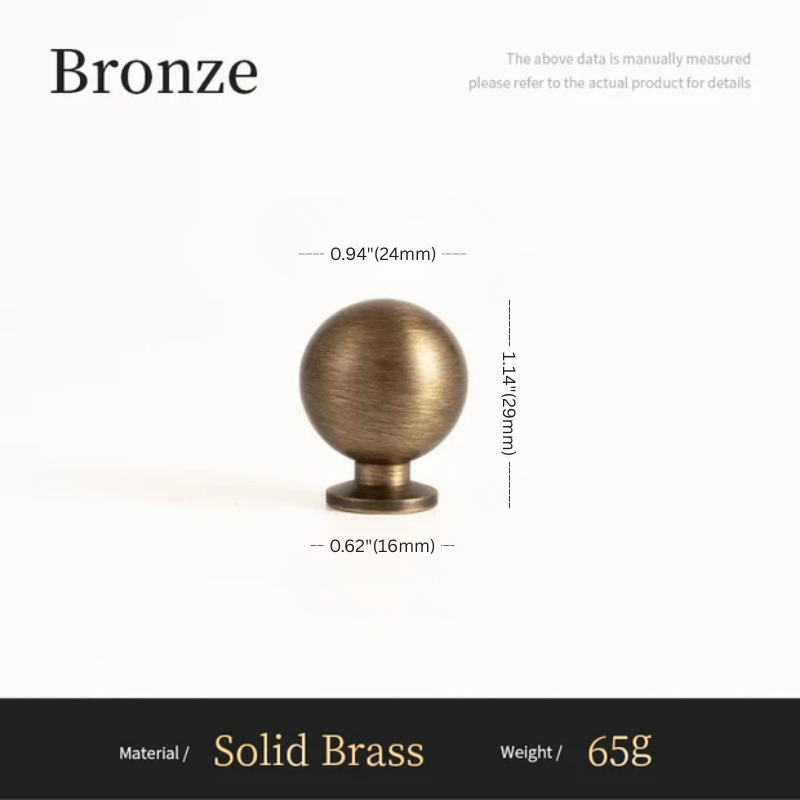 Bronze spherical object with measurements on a white background