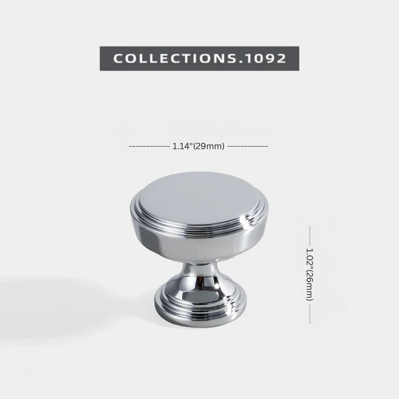 Chrome cabinet knob with dimensions on a white background