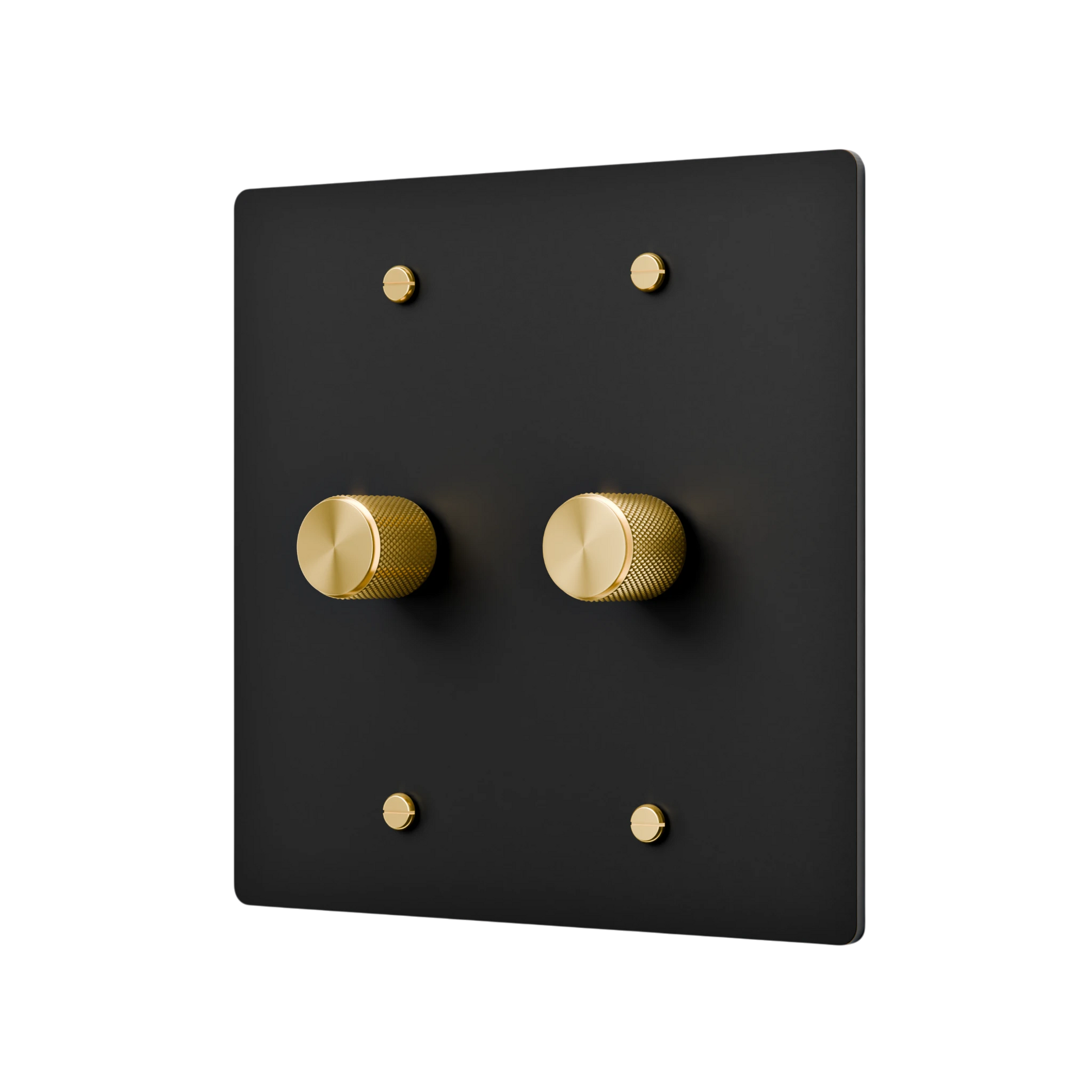 Black switch panel with gold knobs on a white background