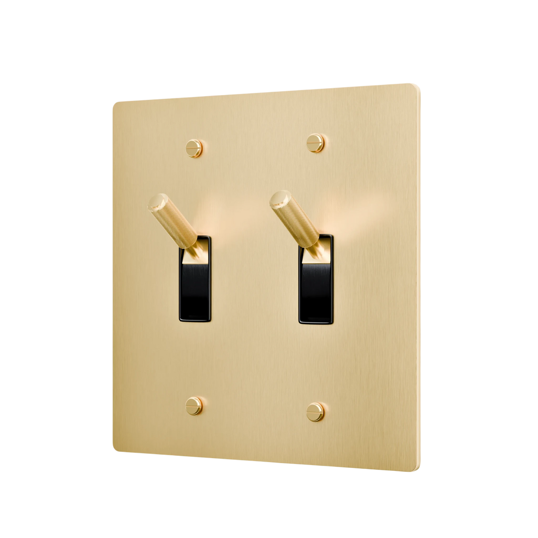Gold double toggle switch with black switches on a white background