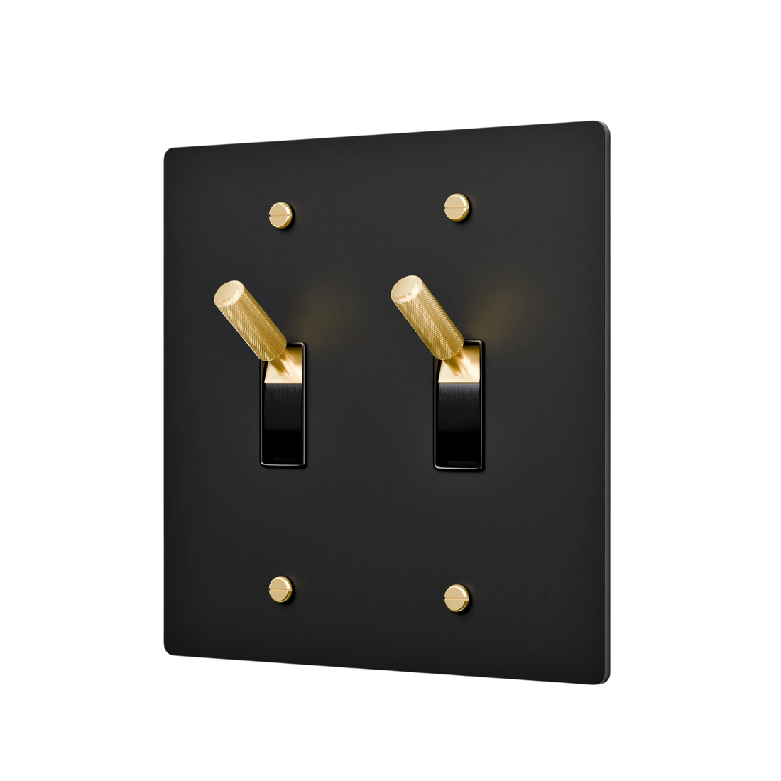 aged brass double toggle switch with black switches on a white background