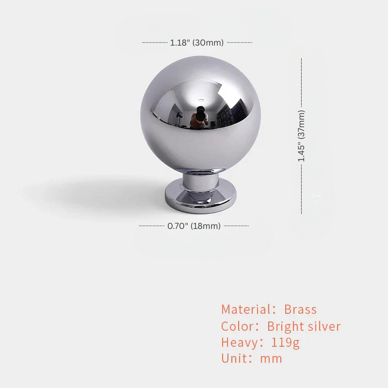 Chrome spherical object with dimensions and material details on a white background