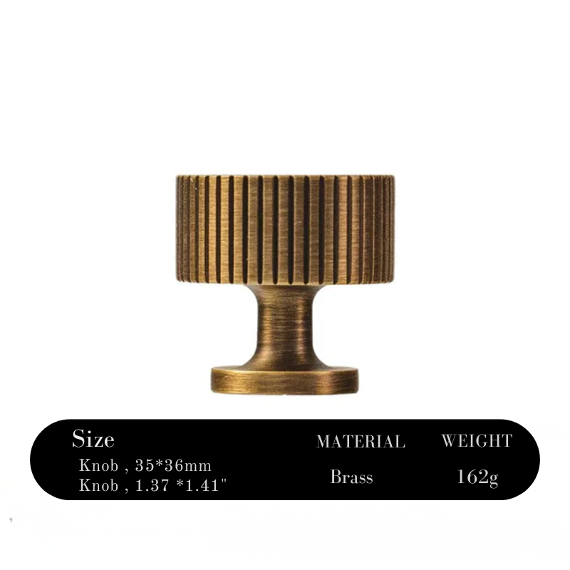 Brass knob with ribbed design on a white background