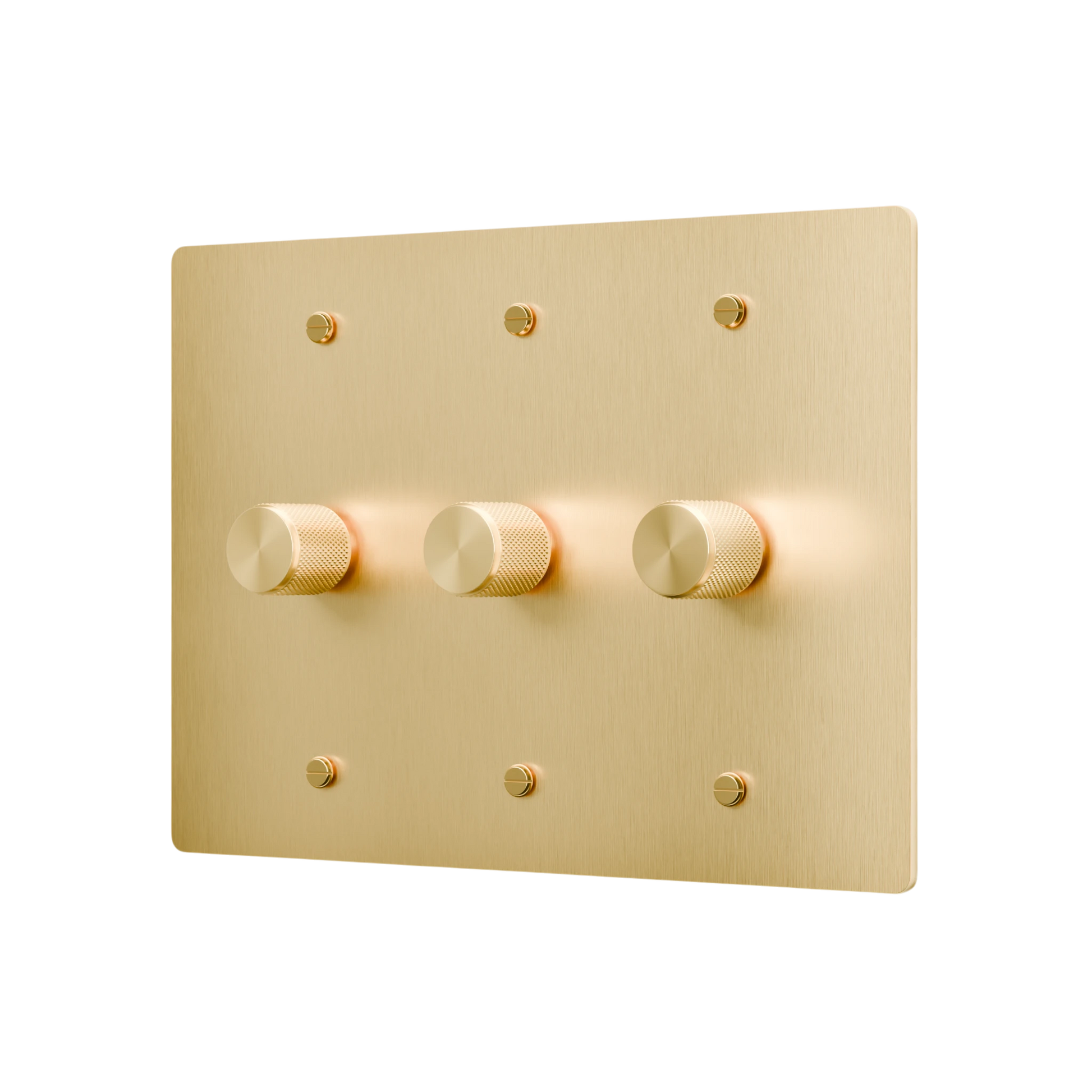 Gold light switch panel with three knobs on a white background
