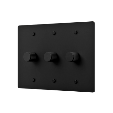 Black rectangular switch plate with three knobs on a white background