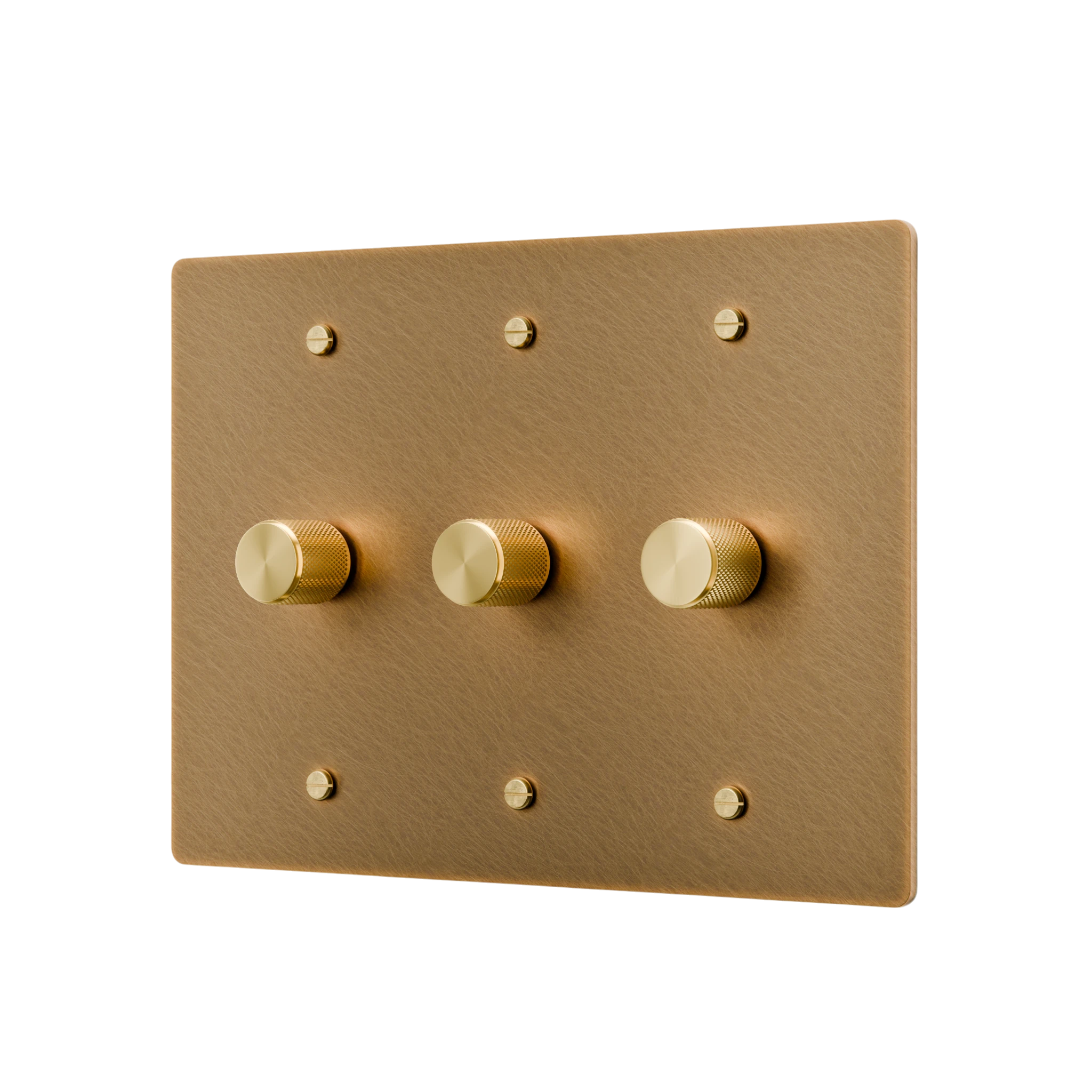 Gold switch panel with three gold knobs on a white background