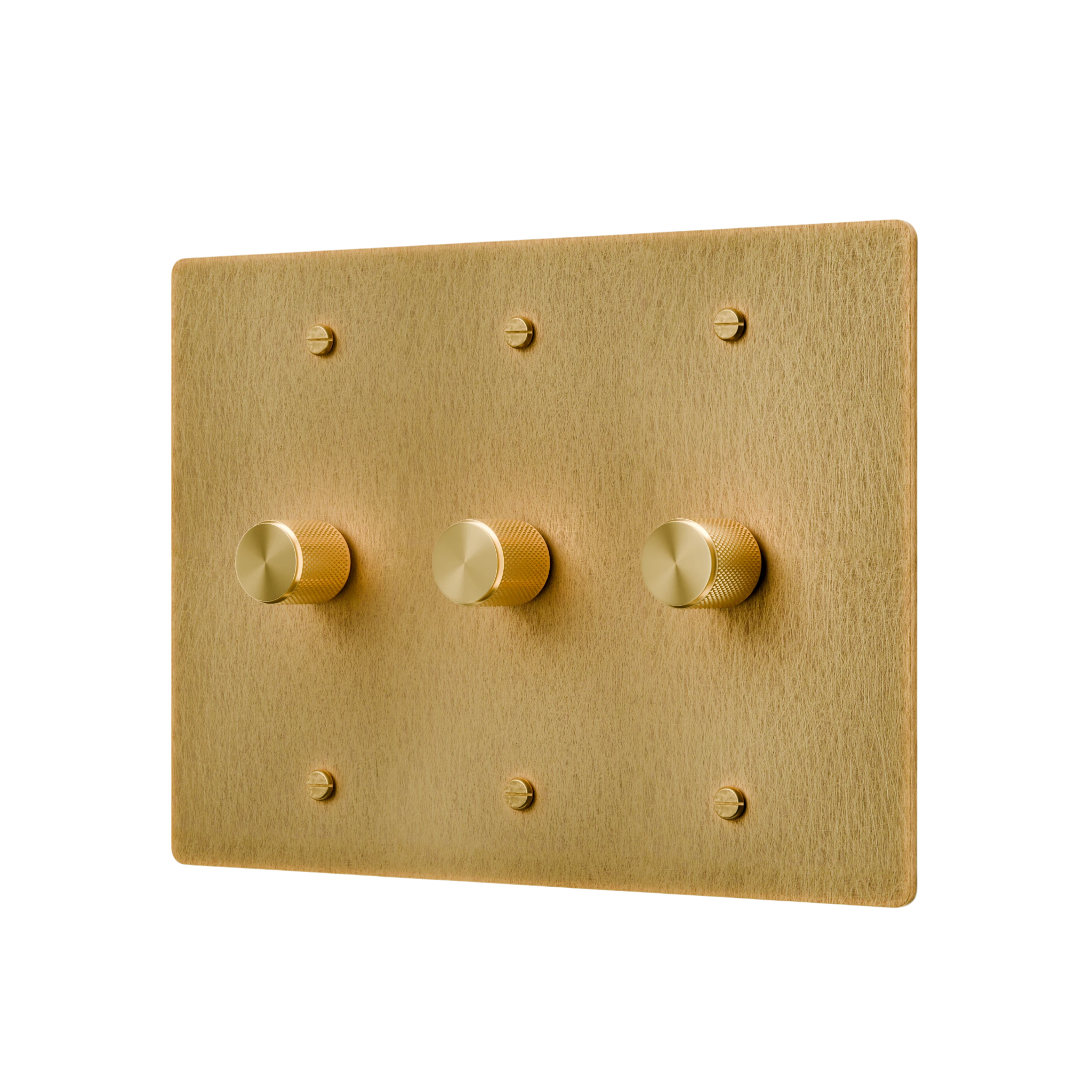 Gold switch plate with three knobs on a white background