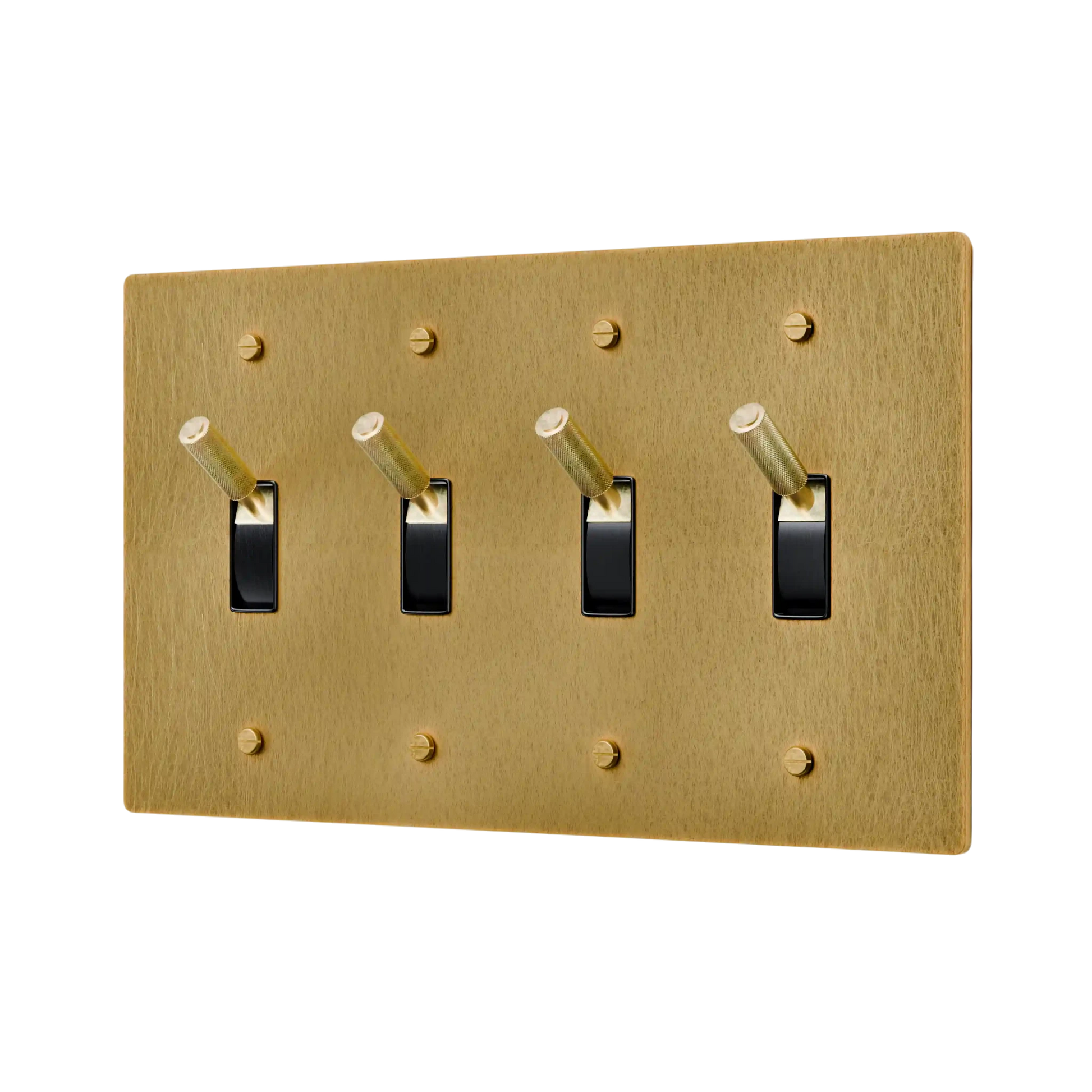 Gold switch plate with four black toggle switches on a white background