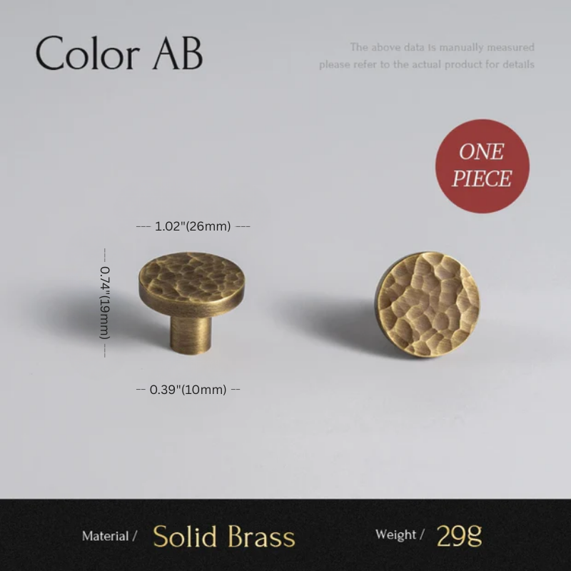 Two solid brass knobs with measurements on a gray background