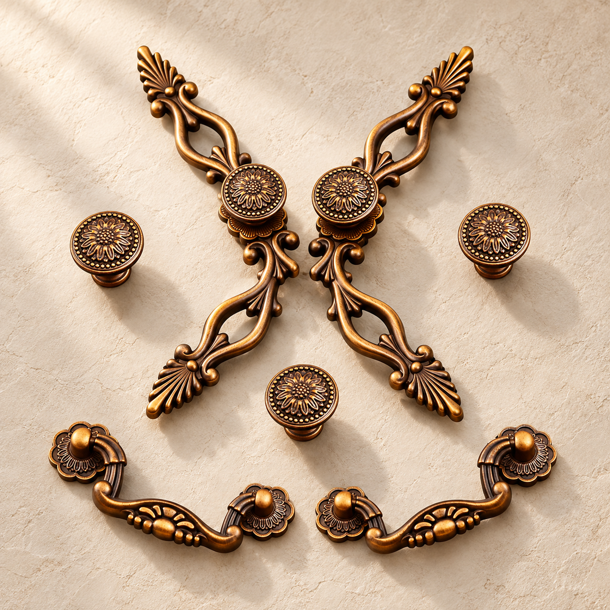 Antique Brass Cabinet Pulls & Knobs — Vintage European Style on a warm ivory background