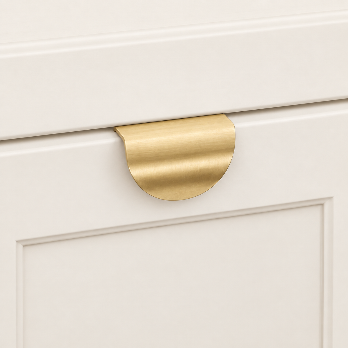 Brushed Brass Hidden Finger Tab Cabinet Pull - Modern Design installed on warm ivory cabinetry