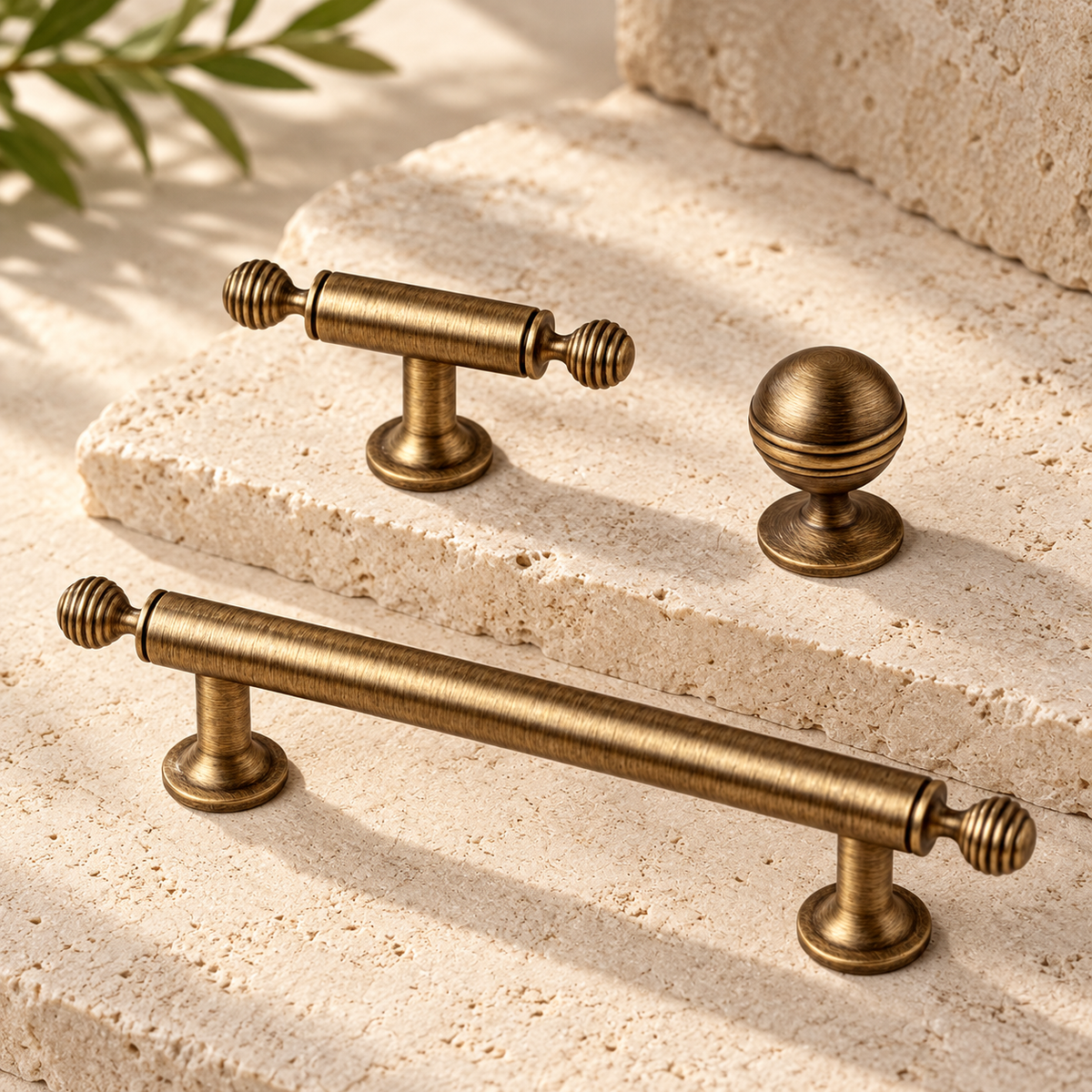Antique Brass Ribbed Cabinet Pulls & Knobs — Solid Brass Hardware on warm ivory stone