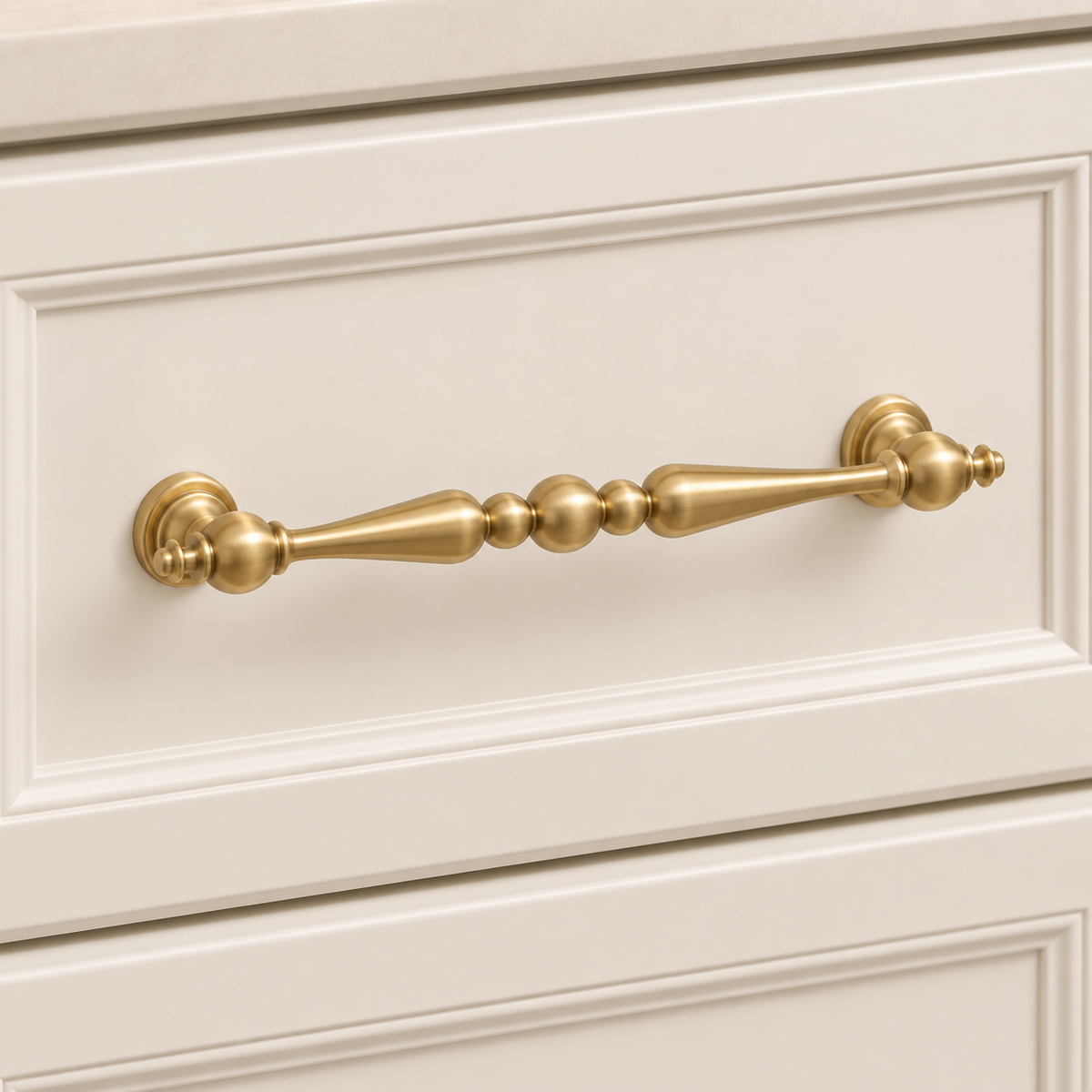 Brushed Brass Solid Brass Cabinet Pulls & Knobs — Modern Design installed on warm ivory cabinetry