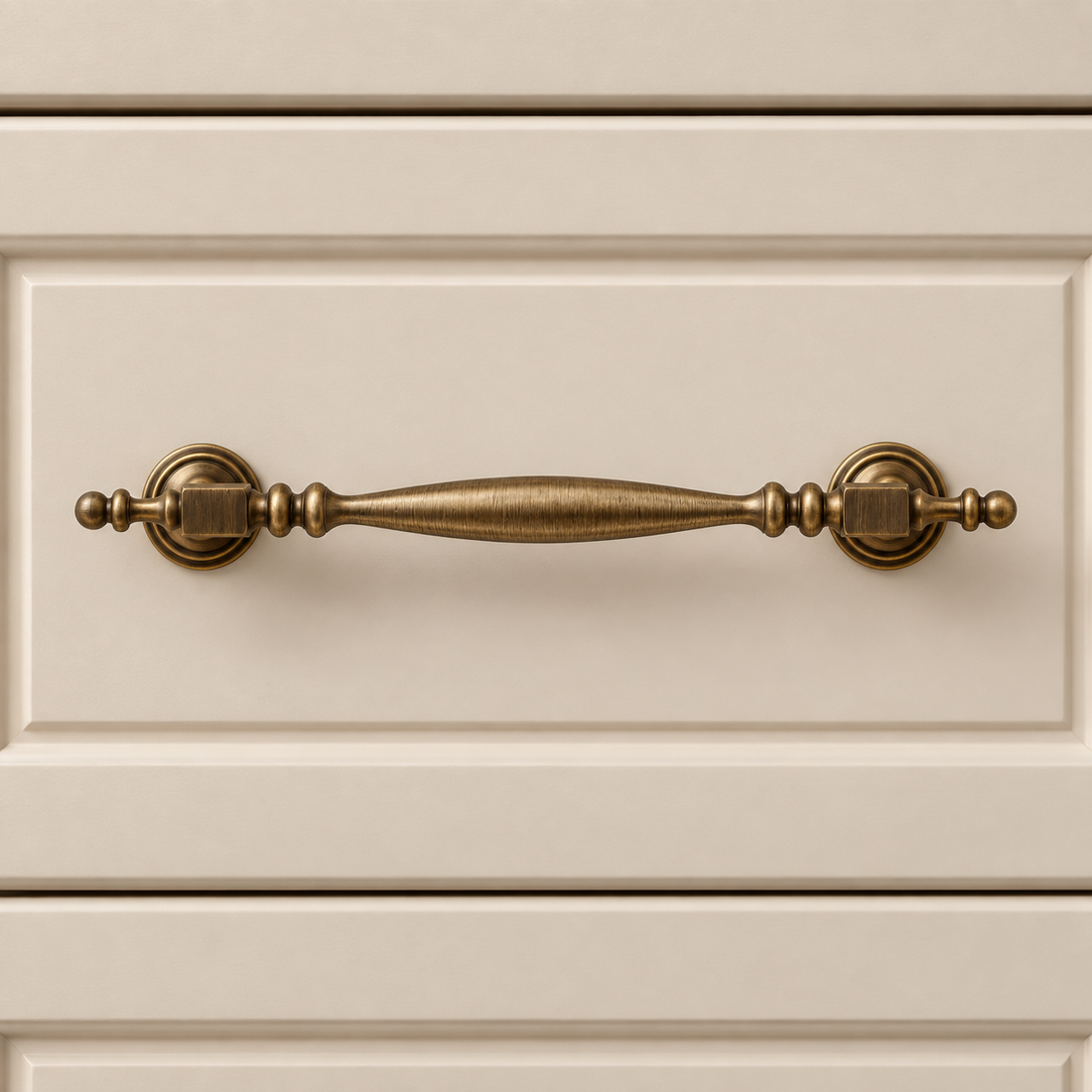 Beaded Column Cabinet Pull & Knob — Antique Brass on warm ivory stone