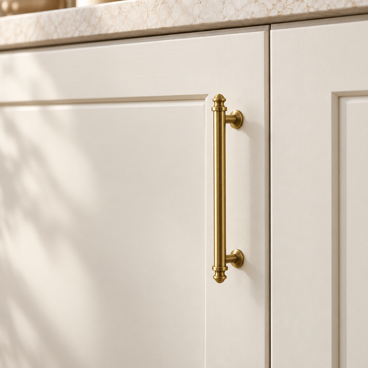 Antique Brass Solid Brass T-Bar Cabinet Pulls & Knobs — Modern Design installed on warm ivory cabinetry