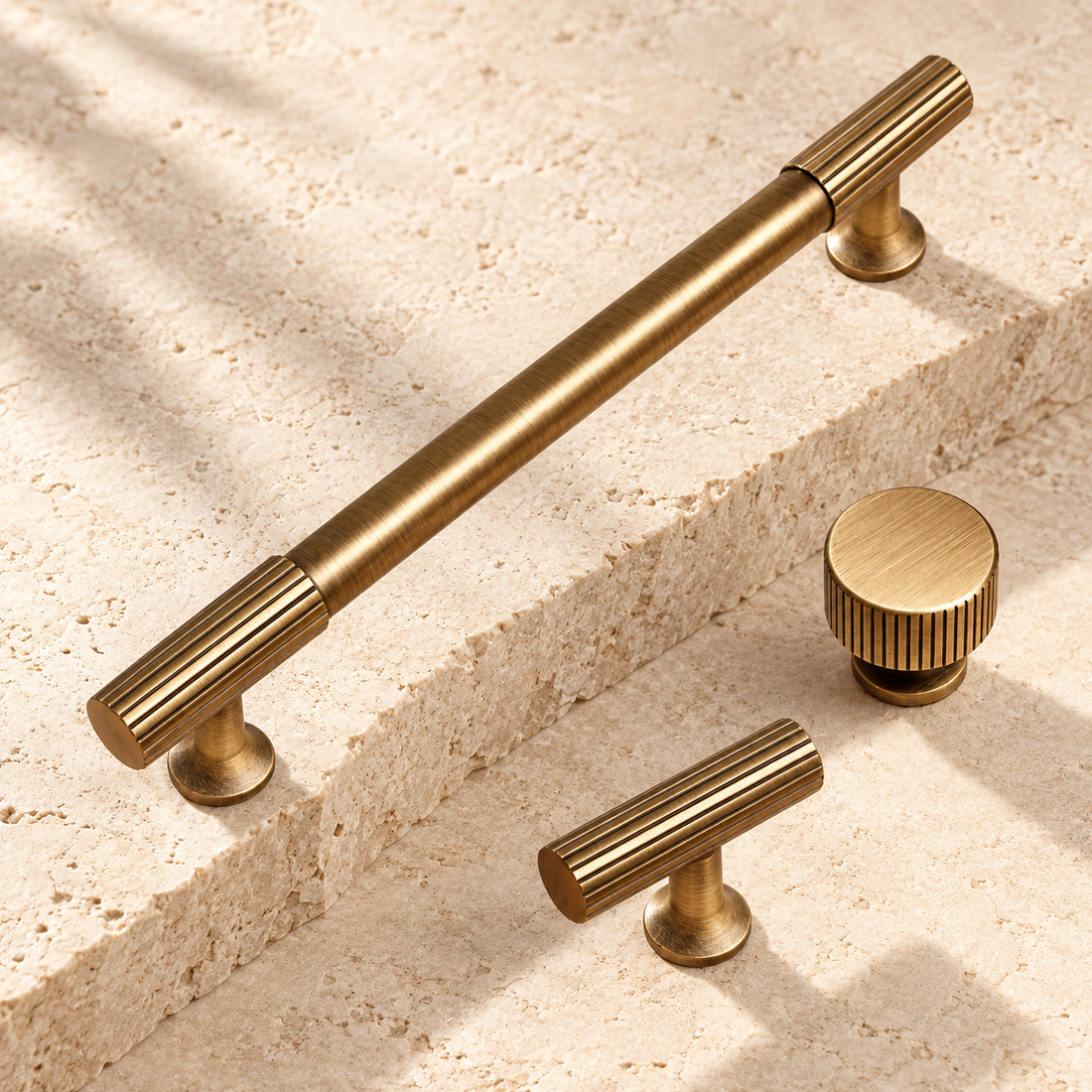 Antique Brass Ribbed Cabinet Pull, Knob & T-Bar - Solid Brass on warm ivory stone