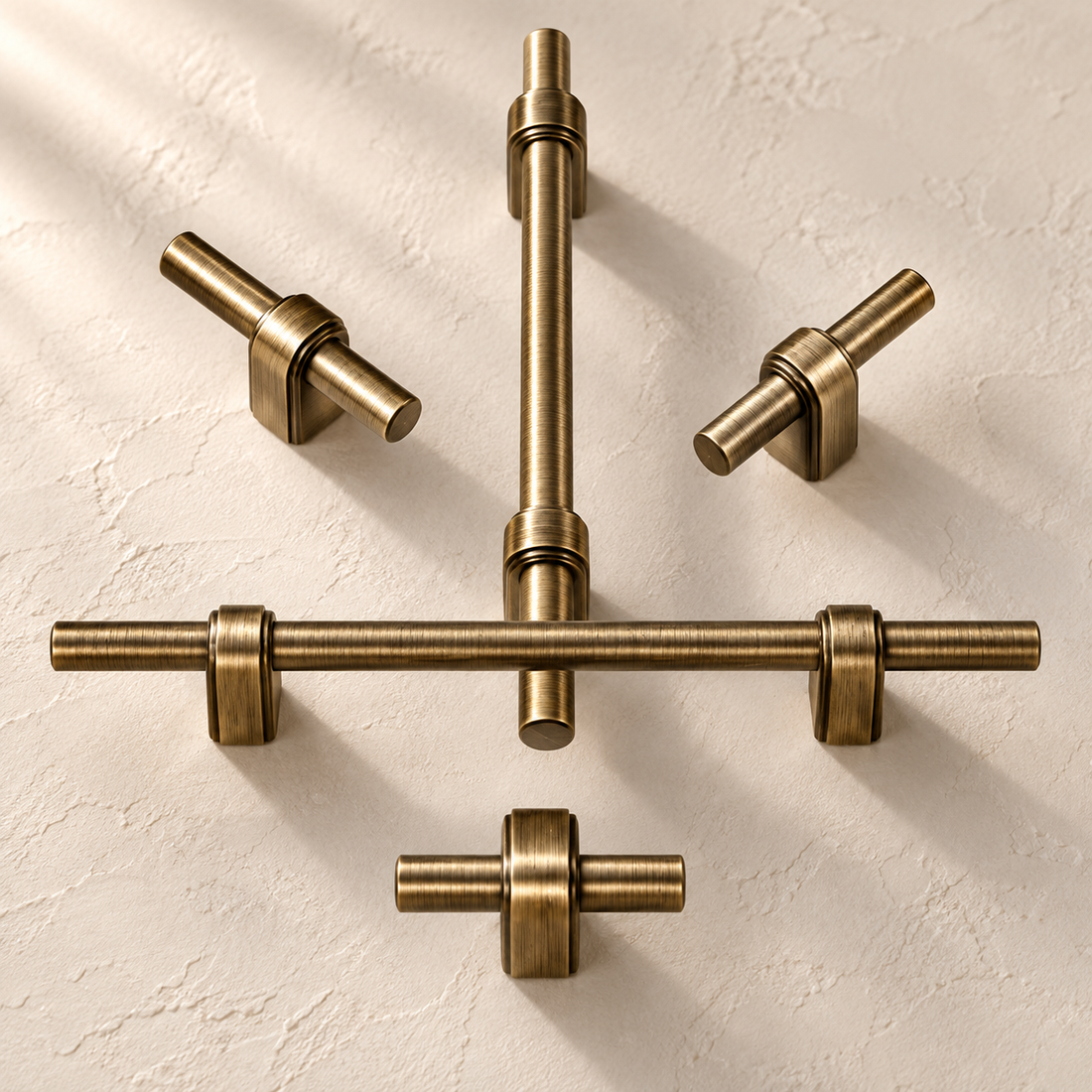 Antique Brass Cabinet Pull & T-Knob — Solid Brass on a warm ivory background