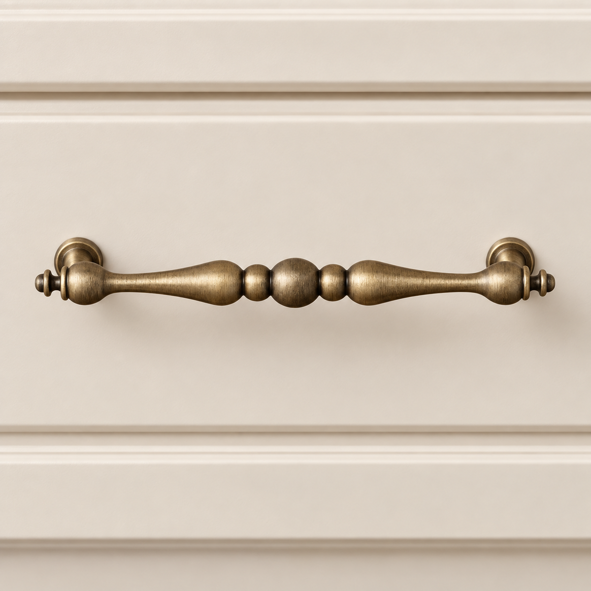 Antique Brass T-Bar Cabinet Pull & Knob — Solid Brass installed on warm ivory cabinetry