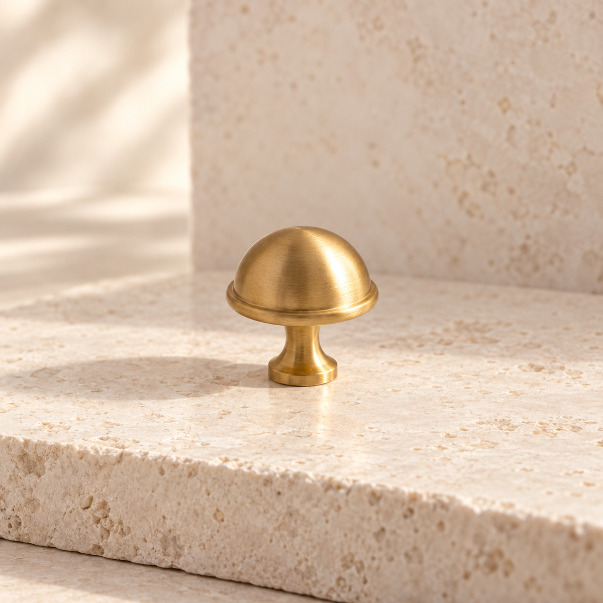 Brushed Brass Crown Design Cabinet Pull & Knob — Solid Brass on warm ivory stone