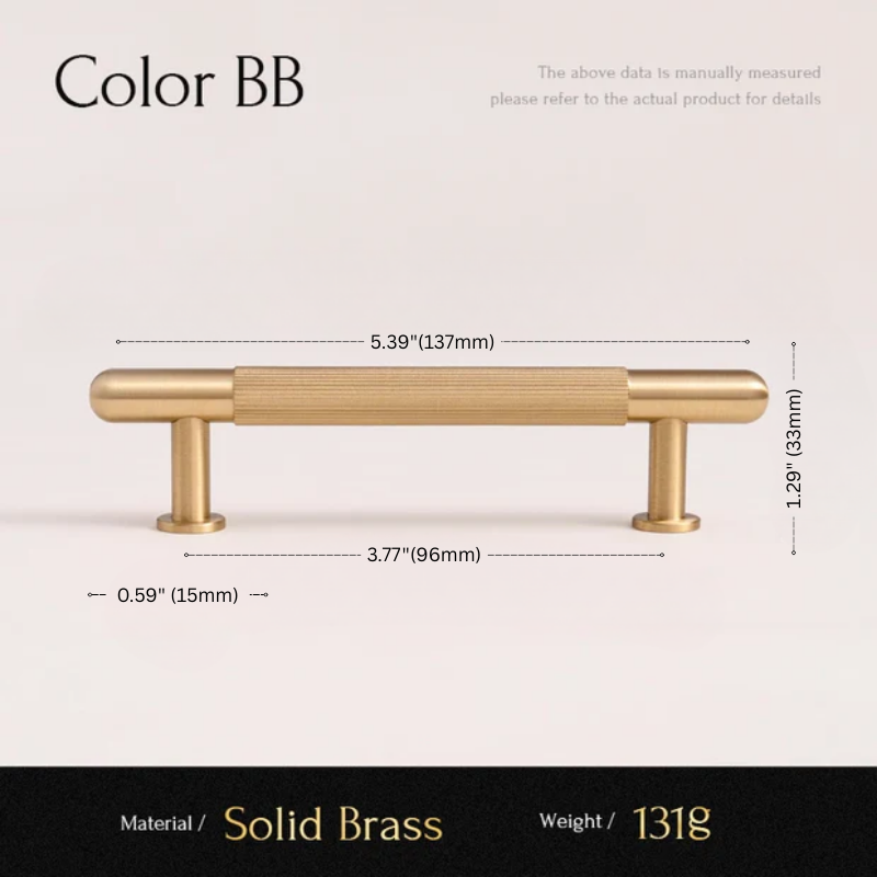 Gold cabinet handle with dimensions and material details on a light pink background