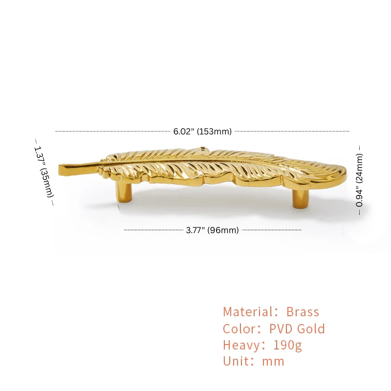 Gold feather-shaped object with measurements on a white background