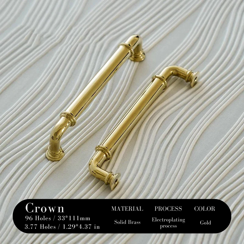 Gold cabinet handles on a textured beige background with product details.