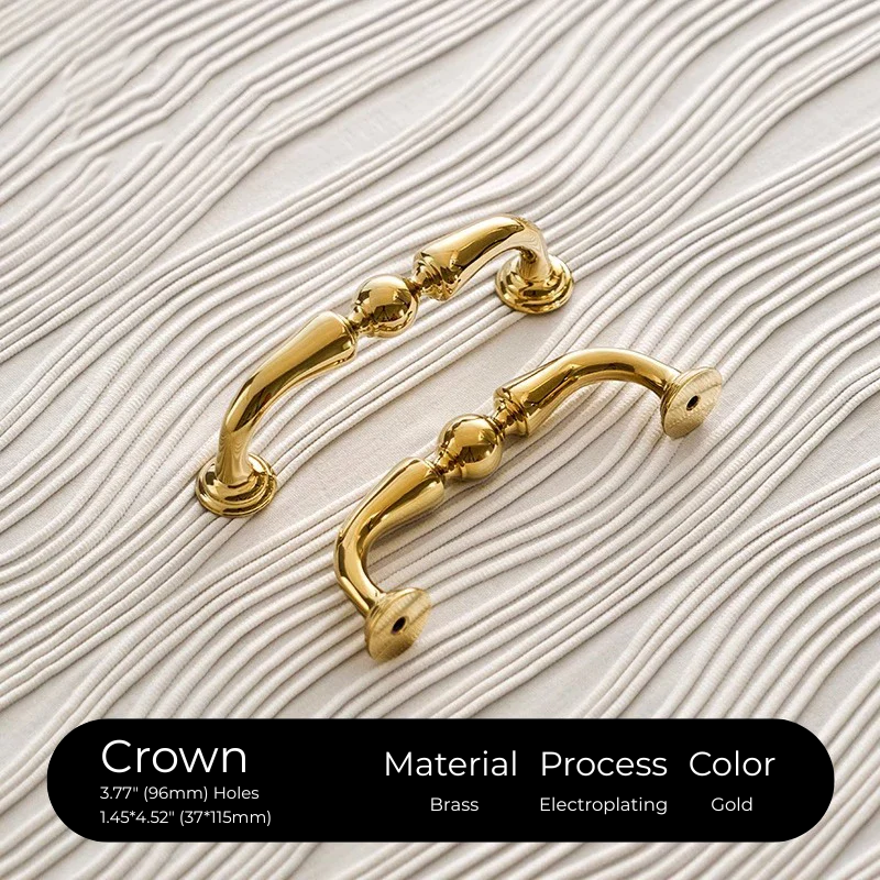 Two gold cabinet handles on a textured beige background with product details.
