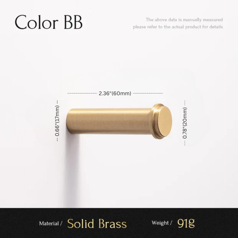 Gold cylindrical object with measurements on a white background