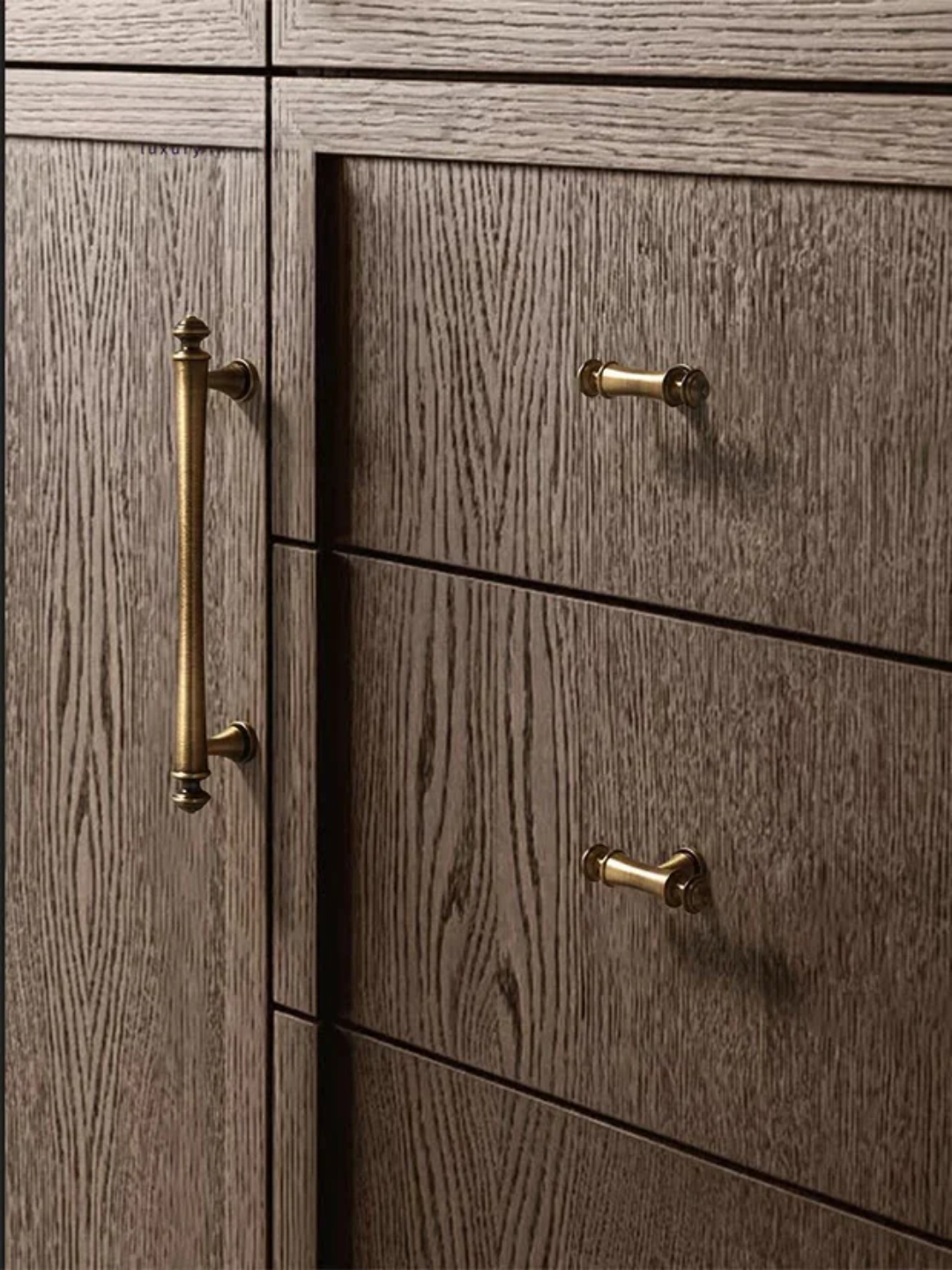 Wooden cabinet with brass handles