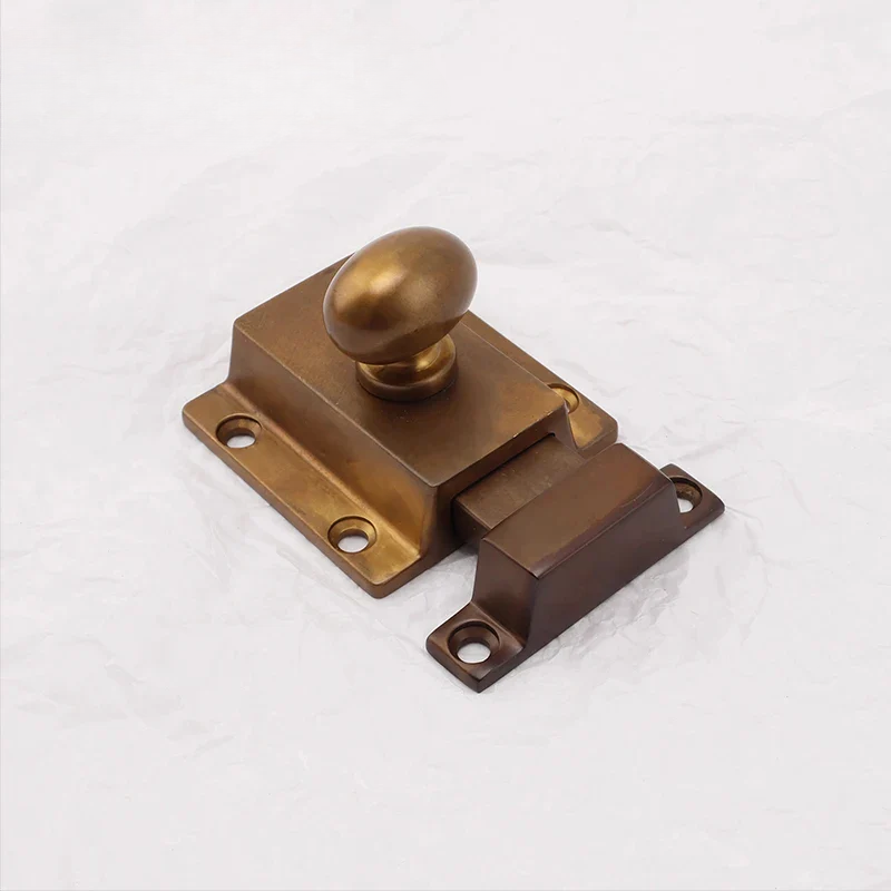 Set of brass door handles on a white background