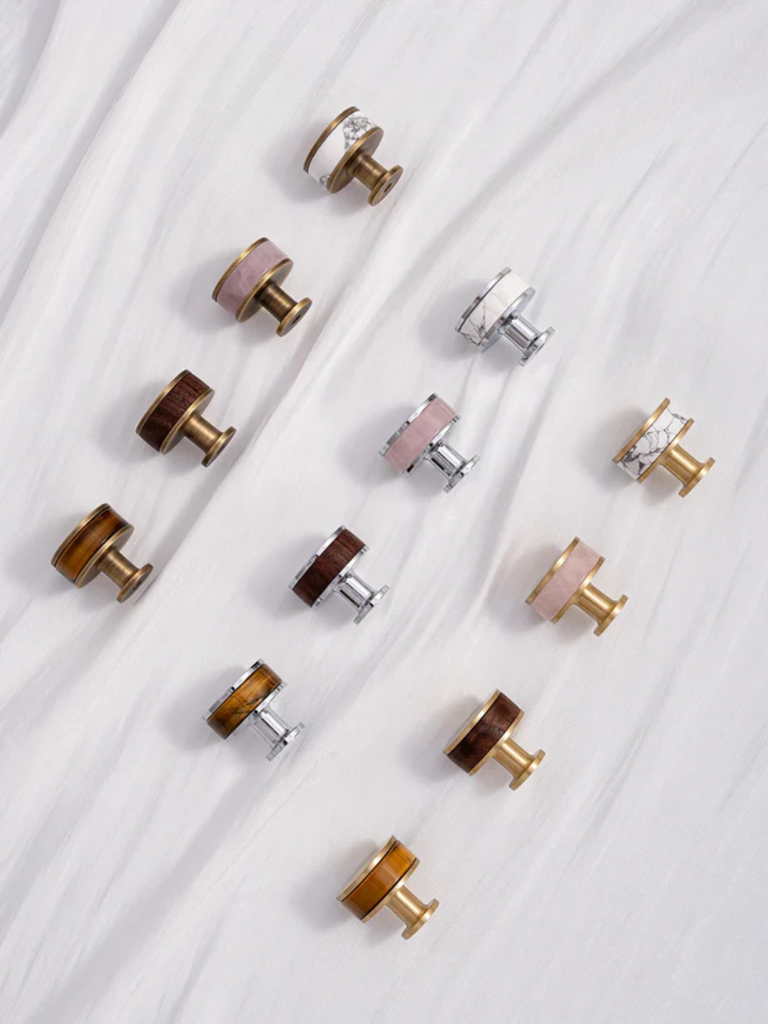 Set of various door knobs on a white background