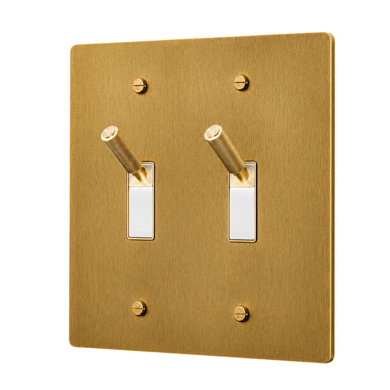 Gold double toggle switch plate with white switches on a white background
