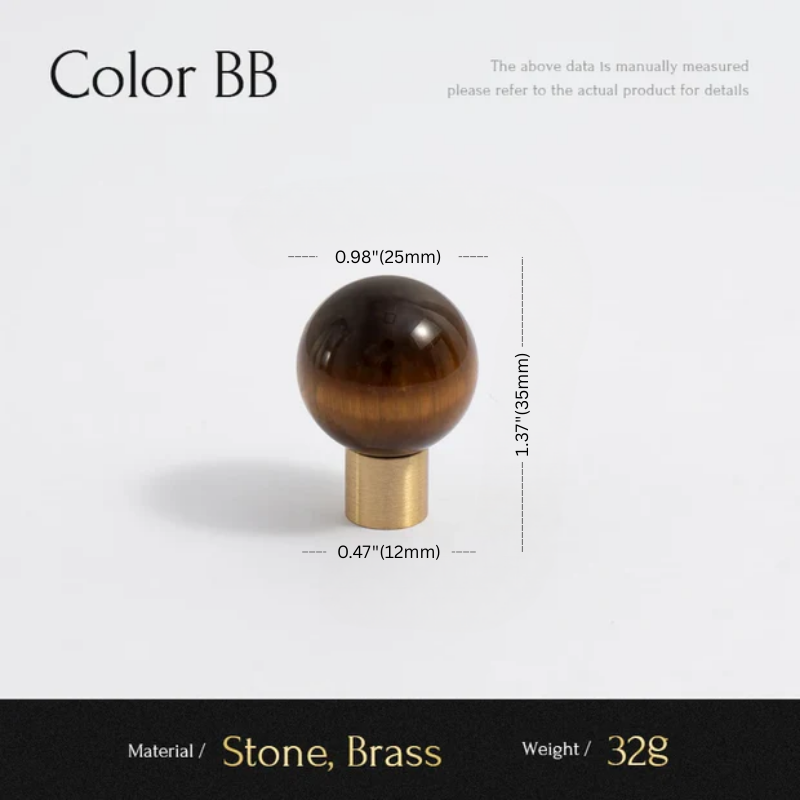 Measurement chart of a decorative object with stone and brass components on a white background.