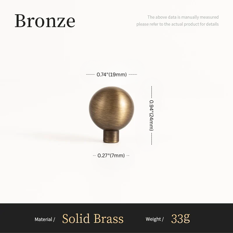 Bronze spherical object with measurements on a white background