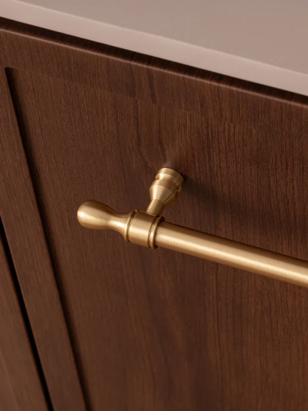 Wooden cabinet with a gold handle