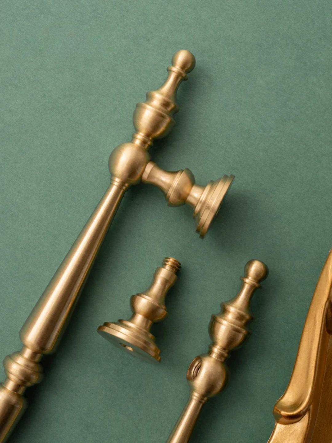 Gold decorative elements on a green background