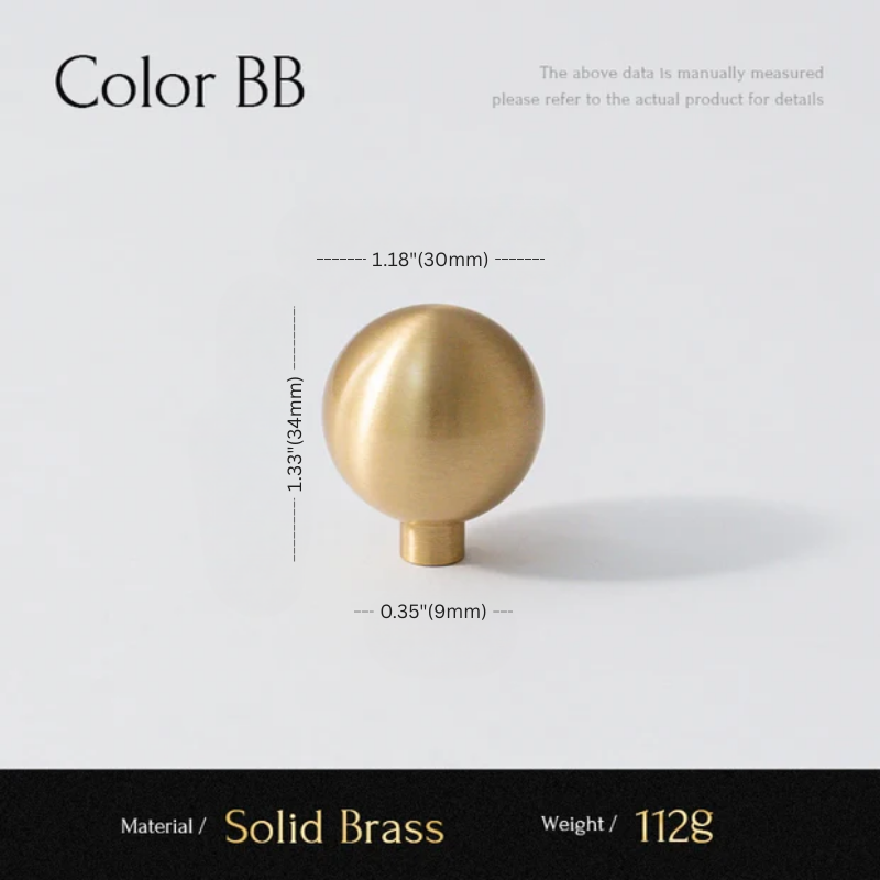 Gold spherical object with measurements on a white background