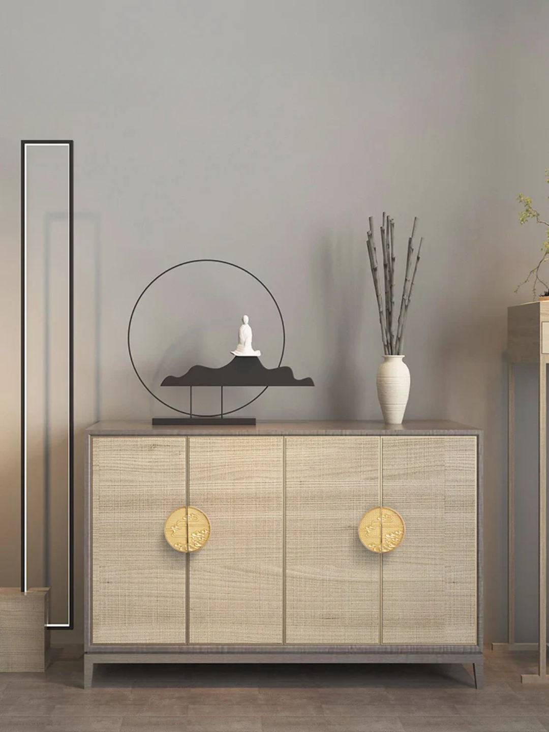Decorative cabinet with gold handles in a room setting