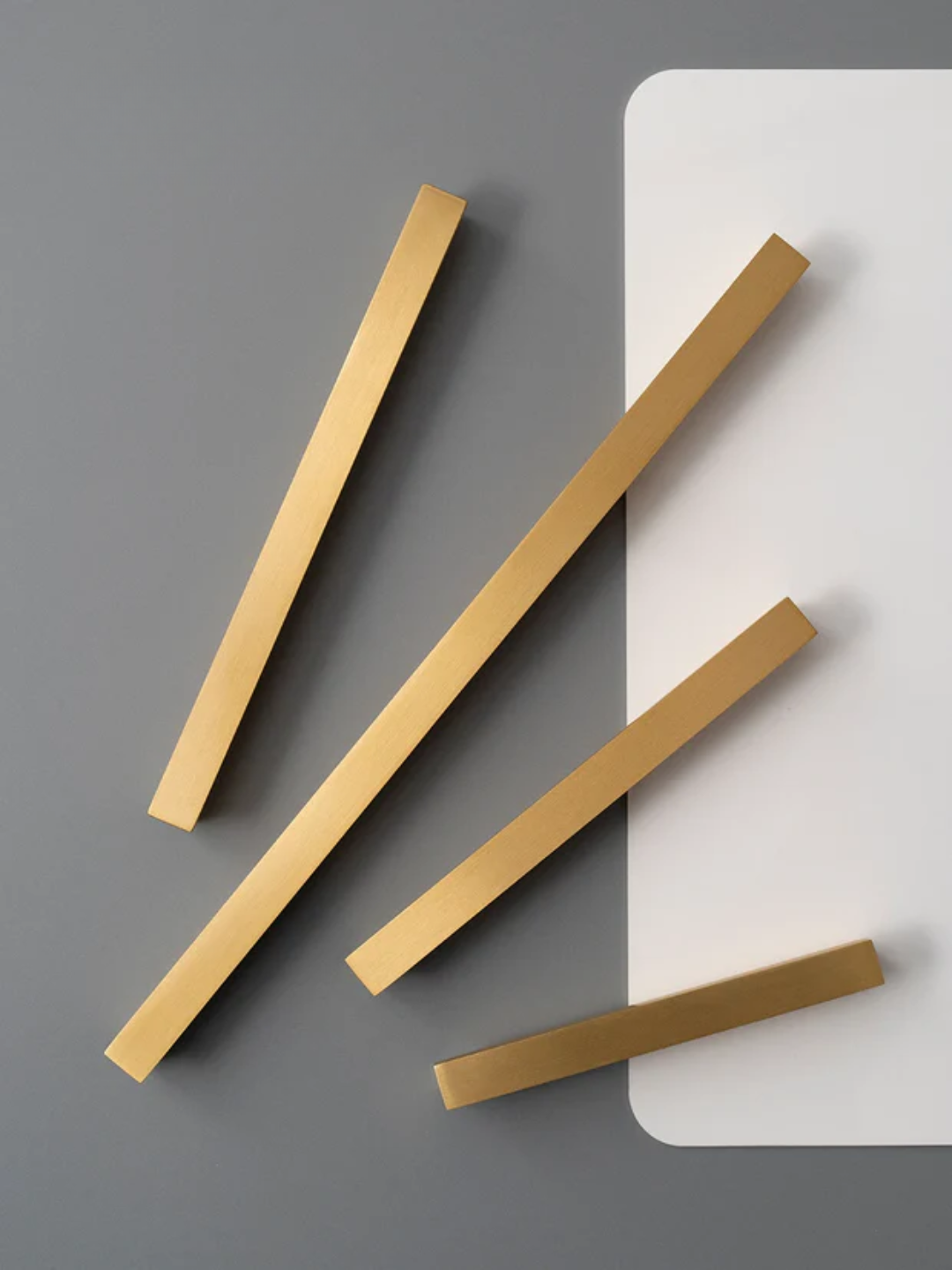 Gold hardware strips on a gray and white background with 'Santaya' branding.