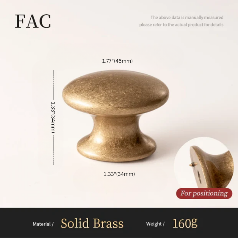 Brass cabinet knob with dimensions and material details on a white background