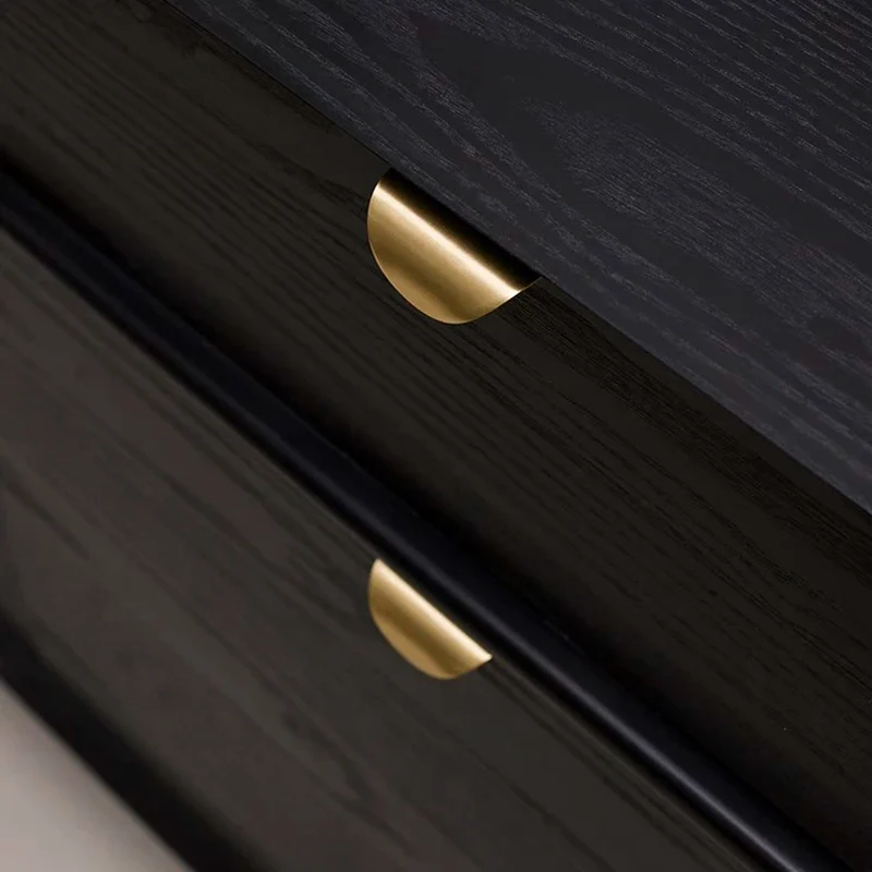 Black wooden drawer with gold handles